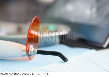 Close-up Of Stomatological Tool For Whitening Teeth In Clinic With Plastic Nozzle. Professional Inst