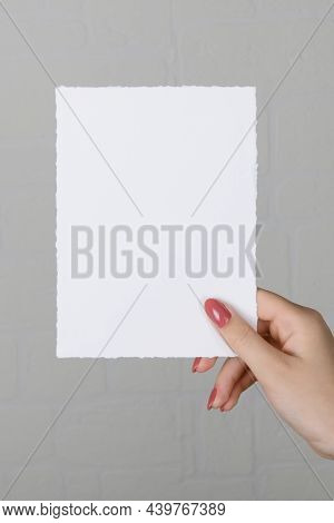 Lose Up Of 5x7 Ratio Card White Empty Card Mockup In Female Hand
