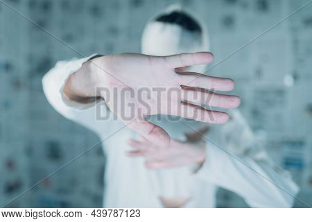 Victim Of Tabloid Journalism And Fake News Infodemic, Conceptual Image Of Man Wrapped In Bandages Su