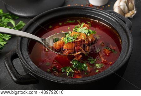 Traditional Ukrainian Russian Borscht On A Dark Background. Borscht With Sour Cream. Beetroot Borsch