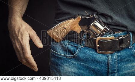 Man With A Revolver In His Belt