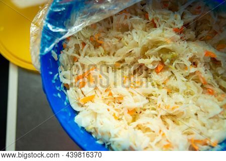 Sauerkraut In A Plastic Container, Top View