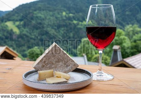 Cheese Collection, French Cheese Tomme De Savoie, Glass Of Red Wine From Savoie And French Mountains