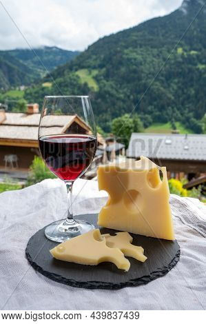 Cheese Collection, French Cow Cheese Emmental, Glass Of Red Wine From Savoie And French Mountains Vi