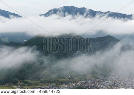 Takeda Castle on mountain in Japan