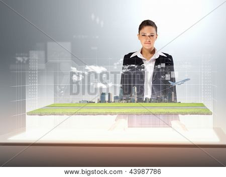 Immagine di giovane imprenditrice in piedi contro foto high-tech dell'aeroplano
