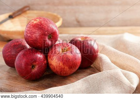 Group Of Gala Apple On Wooden Board Background, Fruits Concept.