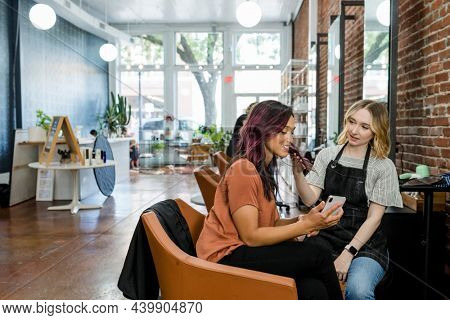 Specialist advising the customer suitable hairstyle