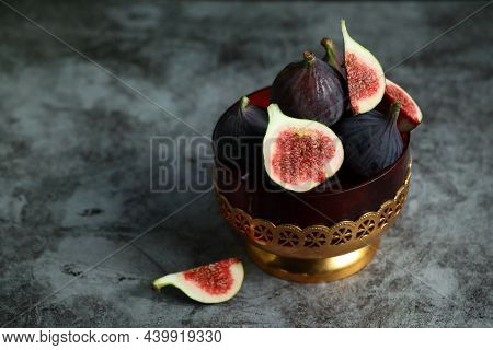 Figs Fruits On The Grey Background With Plzce For Text