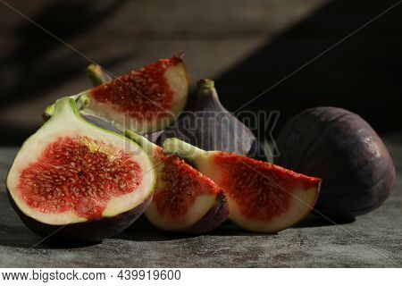 Figs Fruits On The Grey Background With Place For Text