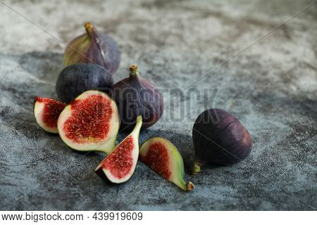 Figs Fruits On The Grey Background With Place For Text