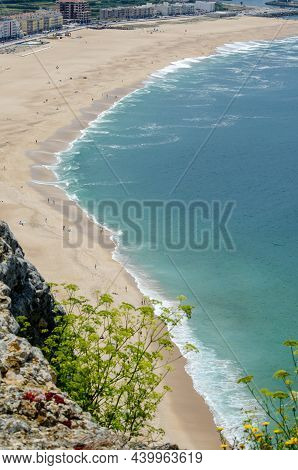 Beach Praia De Nazaré, Viewed From The Cliffs. Portugal.