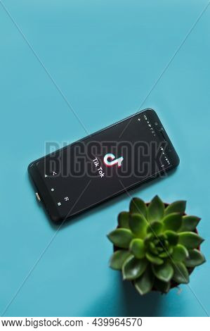 Tver, Russia - February 28, 2020 Succulent And Tik Tok Logo On Smartphone Screen On Blue Background.