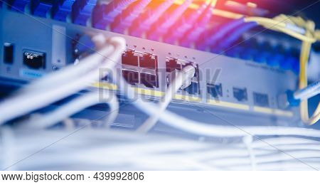 Business Network Panel With Switch And Cable Rj45 In Data Center Blue Background. Concept Connector 