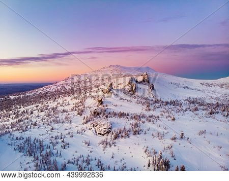 Colorful Winter Sunset In Sheregesh Ski Resort Mountains With Clouds. Aerial Top View Forest Russia