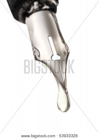 Water Drop Dripping From Nib Of Pen