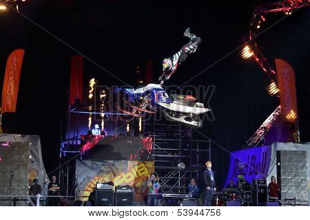 MOSCOW - MAR 02: Snowmobile backflip on the festival extreme sports Breakthrough 2013, on March 02, 2013 in Moscow, Russia. 