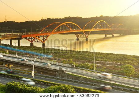 Sunset cityscape of famous Guandu Bridge in Taipei, Taiwan, Asia. Photo manipulation.