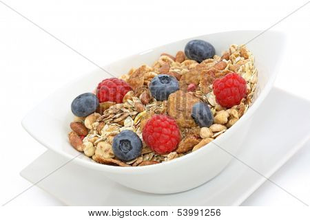 muesli in bowl on white
