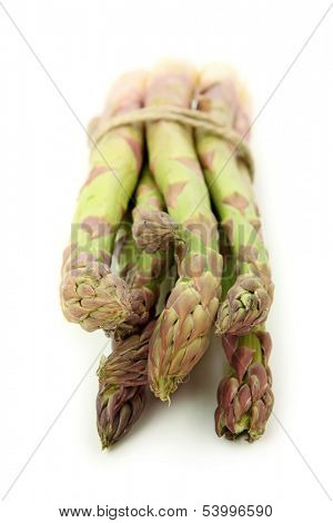 Bunch of green asparagus isolated on white background