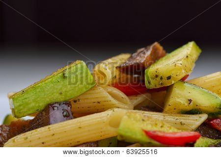 Pasta with shrimps, herbs and mashrooms isolated on white background in studio