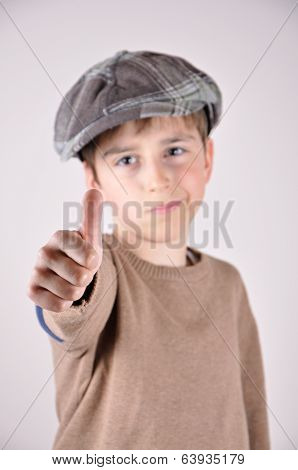 Young boy with a thumb up