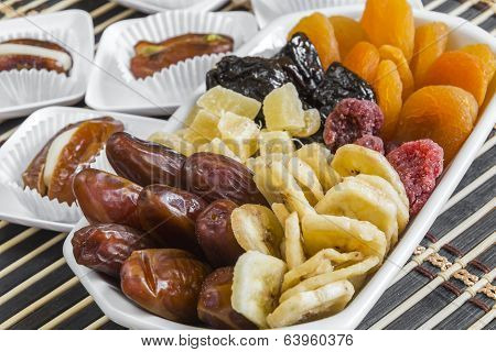 Various Dry Fruits In A Bowl And Dry Dates Stuffed