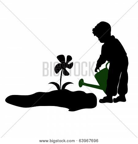 silhouette of a child watering flowers