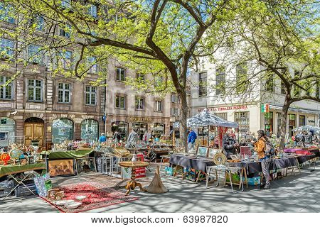 STRASBOURG, FRANCE - APRIL 16: FLEA MARKET IN THE TOWN CENTER. Strasbourg's historic center with a flea market on the square APRIL 16, 2014 2014 in Strasbourg, France.