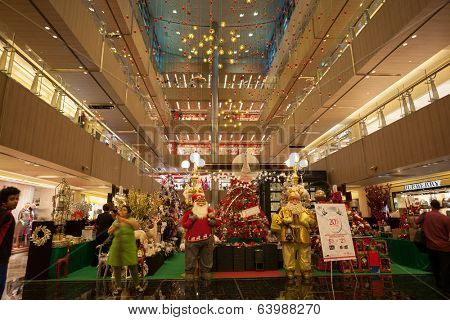 SINGAPORE - NOVEMBER 08, 2012: Fashionable shops on Orchard Road. The famous street of Orchard Road - this 2.2 kms street is the retail and entertainment hub of Singapore and major tourist attraction.