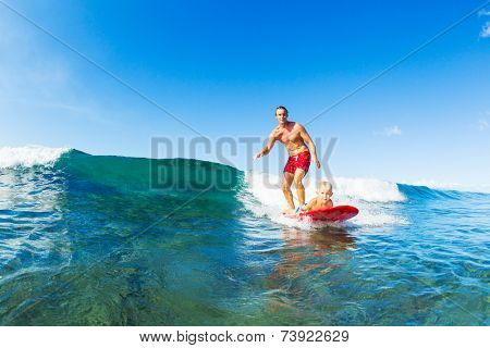 Father and Son Surfing Together. Riding Wave on Surfboard Tandem. Fatherhood, Family Fun Outdoor Lifestyle.