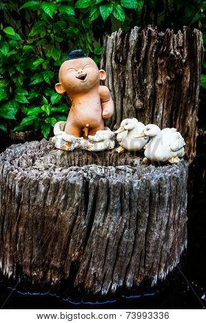 Ceramic dolls in the garden