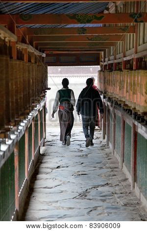 Tibetan People And Prayer Wheels, Labrang Monastery