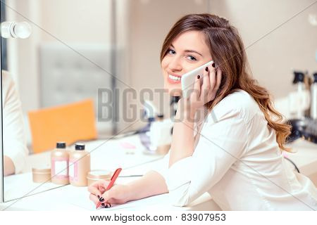 Beautiful woman in hair salon