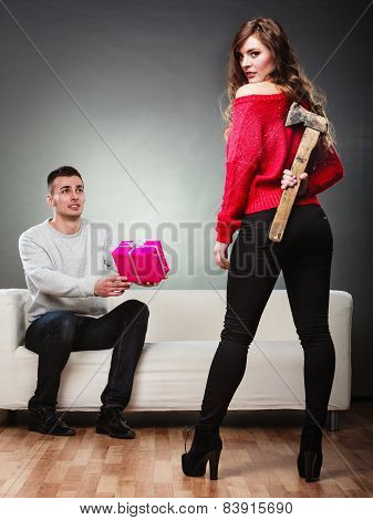 Trusting Guy Giving Present To Misleading Girl