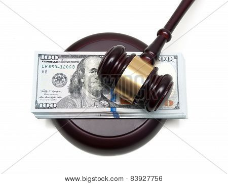 Big Wad Of Money And Gavel Closeup Isolated On A White Background