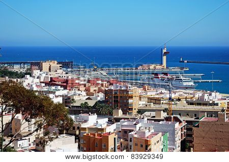 Almeria port and city rooftops.