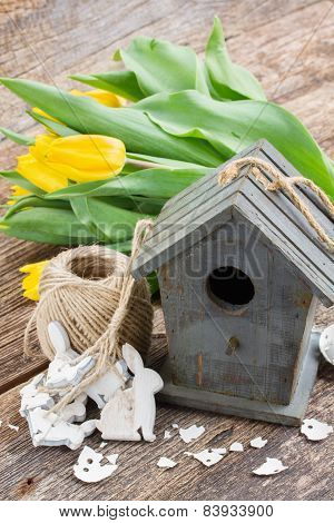 easter decorations with yellow tulips