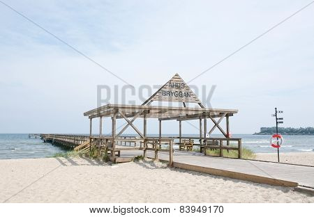 Ahus beach with jetty and life saver