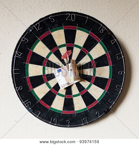 Dartboard With Steeldarts And Euro In It