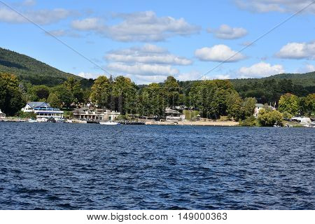 LAKE GEORGE, NY - SEP 24: View of Lake George from the Village, in New York State, as seen on Sep 24, 2016. The lake lies within the upper region of the Great Appalachian Valley and drains all the way northward into Lake Champlain and the St. Lawrence Riv