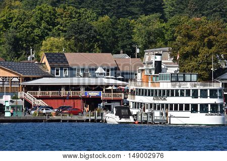 LAKE GEORGE, NY - SEP 24: View of Lake George from the Village, in New York State, as seen on Sep 24, 2016. The lake lies within the upper region of the Great Appalachian Valley and drains all the way northward into Lake Champlain and the St. Lawrence Riv