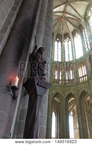Mont Saint Michel France - September 8 2016 Benedictine Abbey of Mont Saint-Michel in Normandy Archangel Michael with scales and sword