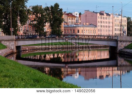 ST. PETERSBURG, RUSSIA - AUGUST 17, 2016: Traffic on the Banny bridge across Pryazhka river. First bridge on this place was built in 1821, and fully reconstructed in 1962-1964