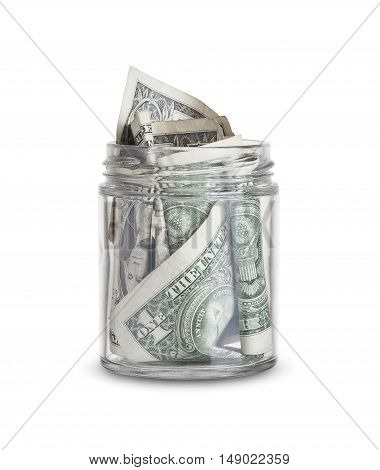 dollar bills in a glass jar isolated on white background