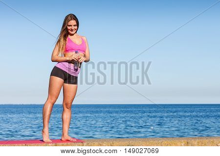 Woman Drinking Water After Sport Gym Outdoor