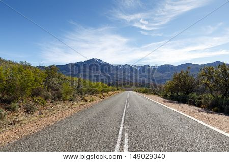The Road To The The Swartberg Pass With Clouds And Snow