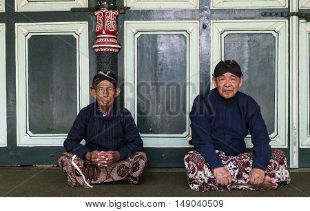Yogyakarta Indonesia - APRIL 7, 2016 : Worker in traditional Javanese costume at Kraton Sultan Palace.