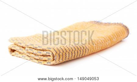 Folded yellow rag towel isolated over the white background