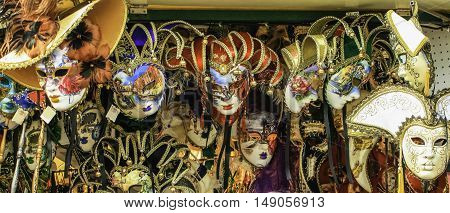 Selection of face masks displayed in a Venice stall